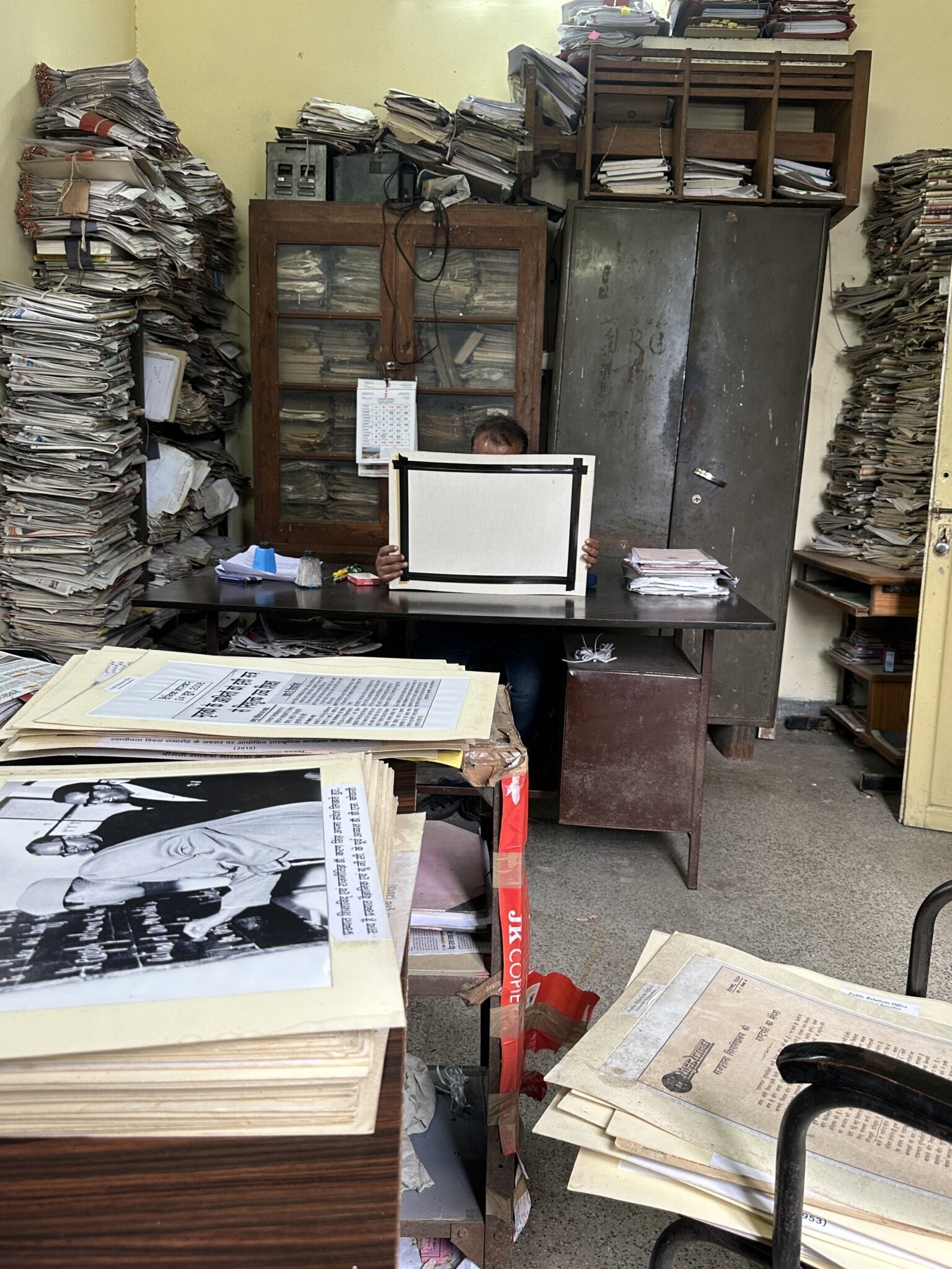 Process of collecting archival images from the public relations office in the University of Rajasthan